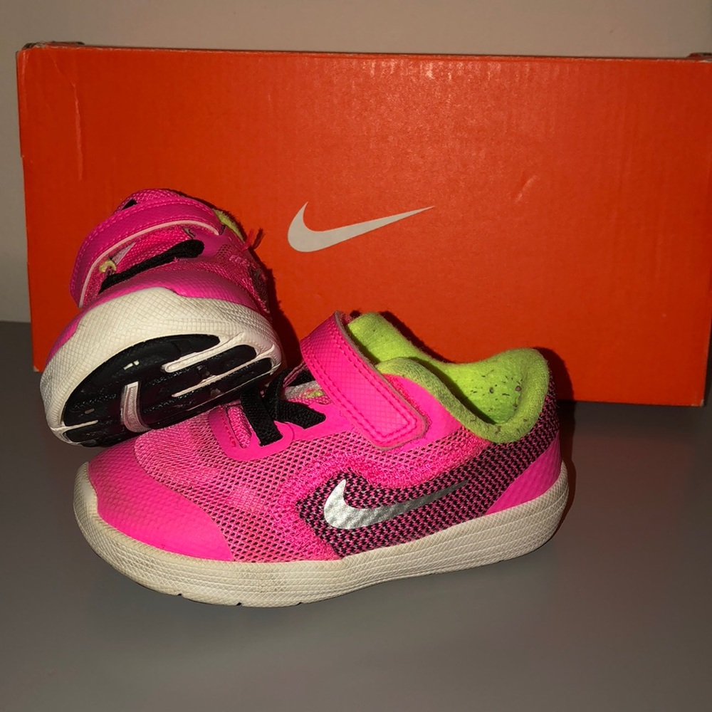 Kids Nike Revolution 3. Size 6C. Pink and silver